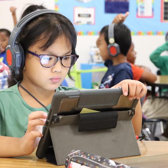 A student works on a tablet 
